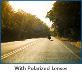 With polarized lenses. Reduces glare from flat surfaces such as roads, water and snow.